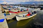 Fishing boats Main Dock Boat Harbour shores of Lake Winnipeg in the town of Gimli Manitoba Canada