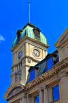 Stock photo of a closeup of the tower at the Prince Edward Building (Globe Theatre) the old Post Office built in 1906 in the Frederick W Hill Mall, City of Regina, Saskatchewan, Canada.

