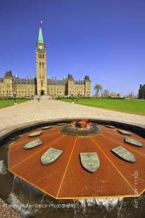 Stock photo of the Centennial Flame on Parliament Hill in front of the Peace Tower in Ottawa, Ontario, Canada.