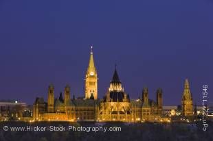 Stock photo of Parliament Hill and the parliament Buildings seen from Nepean Point at dusk, Ottawa, Canada.