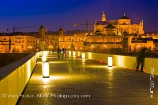 Stock photo of Puente Romano (bridge) and the Mezquita (Mosque) during dusk in the City of Cordoba, UNESCO World Heritage Site, Province of Cordoba, Andalusia (Andalucia), Spain, Europe.