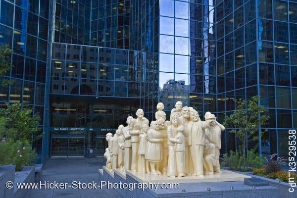 Stock photo of Illuminated Crowd statue artist Raymond Mason BNP Tower Montreal