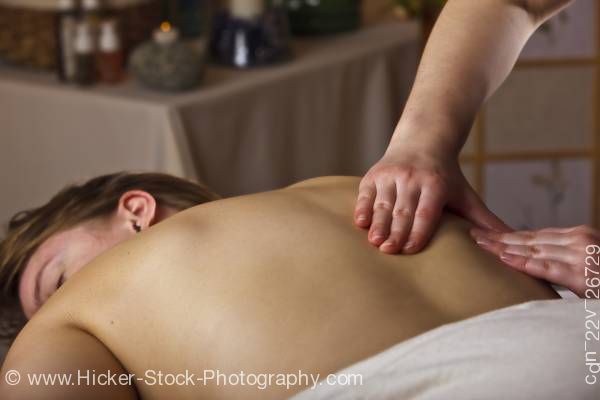 Stock photo of Masseuse back massage Black Bear Resort & Spa Port McNeill Northern Vancouver Island