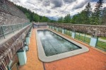 Stock photo of the Cave and Basin Pool at the Basin National Historic Site In Sulphur Mountain, Banff National Park, Alberta, Canada.