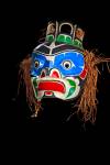 Stock photo of a hand carved mask made by a an Original First Nations artist seen on display at the Just Art gallery in Port McNeill, Northern Vancouver Island, British Columbia, Canada.