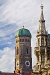 Stock photo of bell tower of the Frauenkirche, aka Domkirche zu Unserer Lieben Frau, (Cathedral of our Blessed Lady) and the Neues Rathaus (New City Hall) in the City of Mnchen (Munich), Bavaria, Germany, Europe.