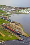 Stock photo aerial view of a large freight ship in dry dock on the waterfront in the City of Thunder Bay, Ontario, Canada.