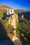 Stock photo of the white washed church belfry beside the Castell de Guadalest, Castle of Guadalest, Guadalest, Costa Blanca, Province of Alicante, Comunidad Valenciana, Spain, Europe.