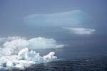 Stock photo of an iceberg in the Strait of Belle Isle seen from Sandy Cove during a foggy day along Highway 430, Trails to the Vikings, Viking Trail, Great Northern Peninsula, Northern Peninsula, Newfoundland, Canada.