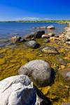 Stock photo of the rocky shoreline of Lake Winnipeg, Hecla Provincial Park, Hecla Island, Manitoba, Canada.