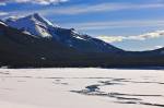 Stock photo of frozen channels through the ice and snow on Medicine Lake, along Maligne Lake Road in Jasper National Park in the Canadian Rocky Mountains, Alberta, Canada.