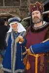 Stock photo of man and woman dressed in medieval clothing during the medieval markets on the grounds of Burg Ronneburg (Burgmuseum), Ronneburg Castle, Ronneburg, Hessen, Germany, Europe.
