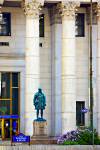 Stock photo of statue of of man in military uniform in front of Bank of Montreal, Winnipeg Square Mall, Downtown Winnipeg.