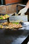 Stock photo of food being prepared at the Mongolie Grill World Famous Stirfry Restaurant in Whistler Village, British Columbia, Canada.