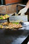 Stock photo of food being prepared at the Mongolie Grill World Famous Stirfry Restaurant in Whistler Village, British Columbia, Canada.