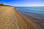 Stock photo of the shores and endless horizon of Lake Erie in Point Pelee National Park, Leamington, Ontario, Canada.