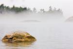 Stock photo of fog shrouded Sinclair Cove in Lake Superior Provincial Park, Ontario Canada. The protected shores and waters of Sinclair Cove in the pristine Lake Superior Provincial Park of Canada, are a hidden gem.