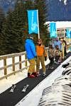 Stock photo of a ski instructor with student on the magic carpet lift on the beginners slope of Whistler Mountain, Whistler Blackcomb, Whistler, British Columbia, Canada. This snowy Winter scene at Whistler Mountain displays the most efficient facilitatio