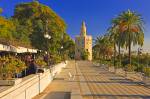 Stock photo of the Torre del Oro (Tower of Gold) which also houses Museo  Maritimo (Naval Museum) from along Paseo Alcalde Marques del Contadero, El Arenal District, City of Sevilla (Seville), Province of Sevilla, Andalusia (Andalucia), Spain, Europe.