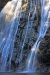 Stock photo of the Virgin Falls, a 53 metre high fan shaped waterfall along Tofino Creek, a transition area of the Clayoquot Sound UNESCO Biosphere Reserve, Vancouver Island, British Columbia, Canada. This close up view allows you to see details of the ma
