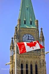 Canadian flag and peace tower at parliament hill Ottawa, Canada.