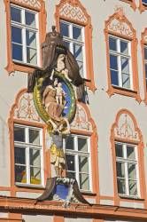 Religious motif on facade of building in Old Town district in City of Landshut Bavaria Germany