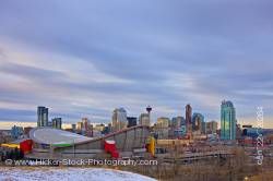 The Saddledome with high-rise buildings the Calgary Tower City of Calgary Alberta Canada