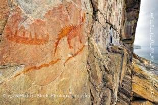 Stock photo of the Agawa rock wall and some of its pictographs along the Agawa Rock Pictograph Trail in Lake Superior Provincial Park in Ontario, Canada.