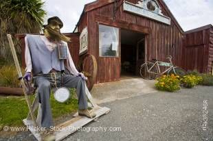 Stock photo of Nicols' Blacksmith Shop with a figure of a bearded man in Duntroon, Waitaki Valley, North Otago, South Island, New Zealand.