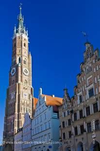 Stock photo of bell tower of Martinskirche (St Martin's Church) and the unique facades of buildings in the Old Town district in the City of Landshut, Bavaria, Germany, Europe.