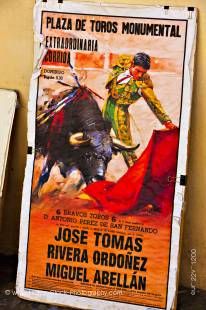 Stock photo of a bull fighting poster outside a store at The Alhambra (La Alhambra) - designated a UNESCO World Heritage Site, City of Granada, Province of Granada, Andalusia (Andalucia), Spain, Europe.