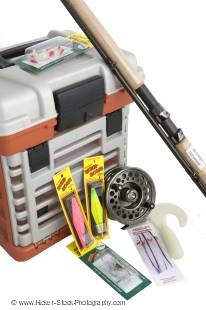 Stock photo of fishing box with fishing gear.