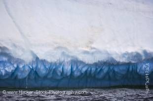 Stock photo of an Iceberg floating in Iceberg Alley taken while on an iceberg watching tour with off the Great Northern Peninsula, Northern Peninsula, Newfoundland, Canada. 