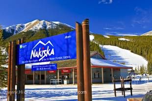 Stock photo of a sign at the entrance to the base station of Nakiska Ski Resort during winter on the slopes of Mount Allan (2789 metres/9150 feet), the site of the Alpine Events of the 1988 Olympic Winter Games, Evan-Thomas Provincial Recreation Area