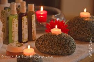 Stock photo of beauty products and tea light candles creating a beautiful relaxing atmosphere.