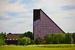 Stock photo of the Royal Canadian Mint Building with its rose coloured glass exterior in the City of Winnipeg, Manitoba, Canada. 