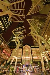 Stock photo of a night scene of tree sculptures dominating the Stephen Avenue Mall walkway, 8th Avenue SW, City of Calgary, Alberta, Canada.