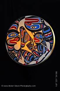 Stock photo of a Native Art Drum by Trevor Hunt featuring Wildman (Pugwis) and the Killer Whale. 