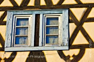 Stock photo of windows of an old building in the town of Michelstadt, Hessen, Germany, Europe.