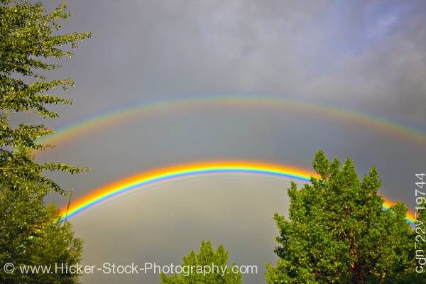 Stock photo of Double rainbow during thunder storm city of Regina Saskatchewan Canada