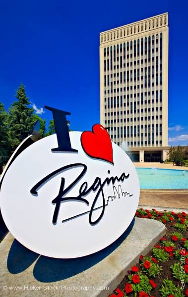 Stock photo of City Hall building, fountain, sign in Queen Elizabeth II Court City of Regina Saskatchewan Canada