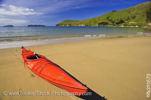 Stock photo of Red Kayak Titirangi Bay Beach Marlborough South Island New Zealand