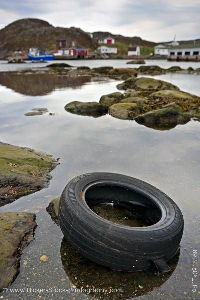 Stock photo of Pollution Car tire Great Brehat Viking Trail Northern Peninsula Newfoundland Canada