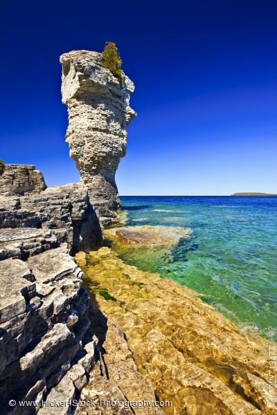 Stock photo of Sea Stack rocky shoreline Flowerpot Island Fathom Five National Marine Park Lake Huron Ontario