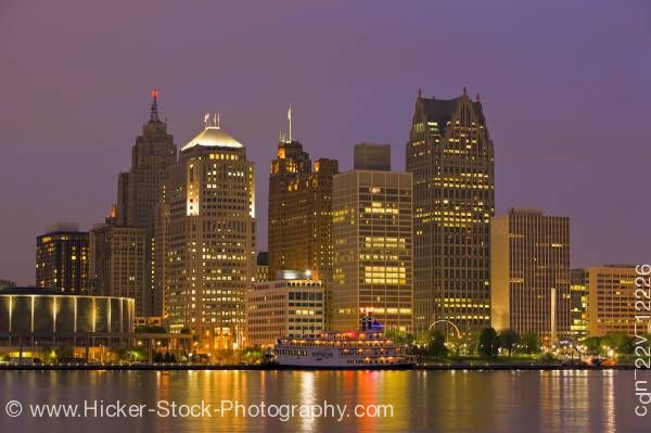 Stock photo of Skyline Detroit Michigan USA at dusk seen from the waterfront in the city of Windsor Ontario