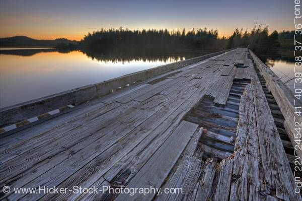 Stock photo of Wooden bridge sunset Clayoquot Arm of Kennedy Lake Vancouver Island British Columbia Canada